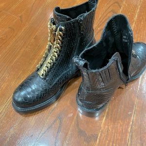 Jeffrey Campbell black snake print boots with gold chain and zipper details